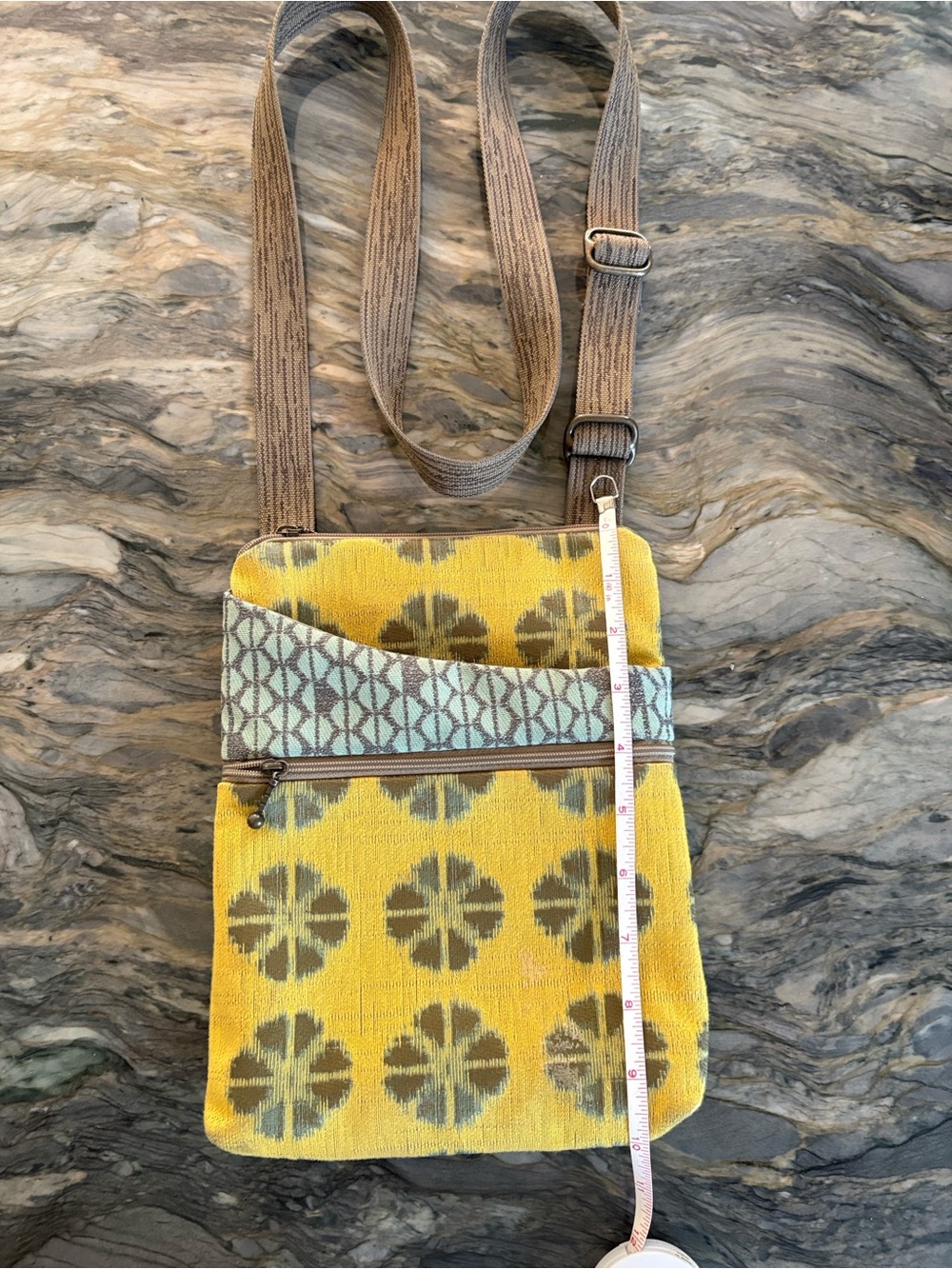 MARUCA like new crossbody with adjustable strap .